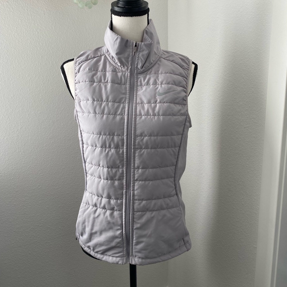Nike sleeveless puffer jacket in size S